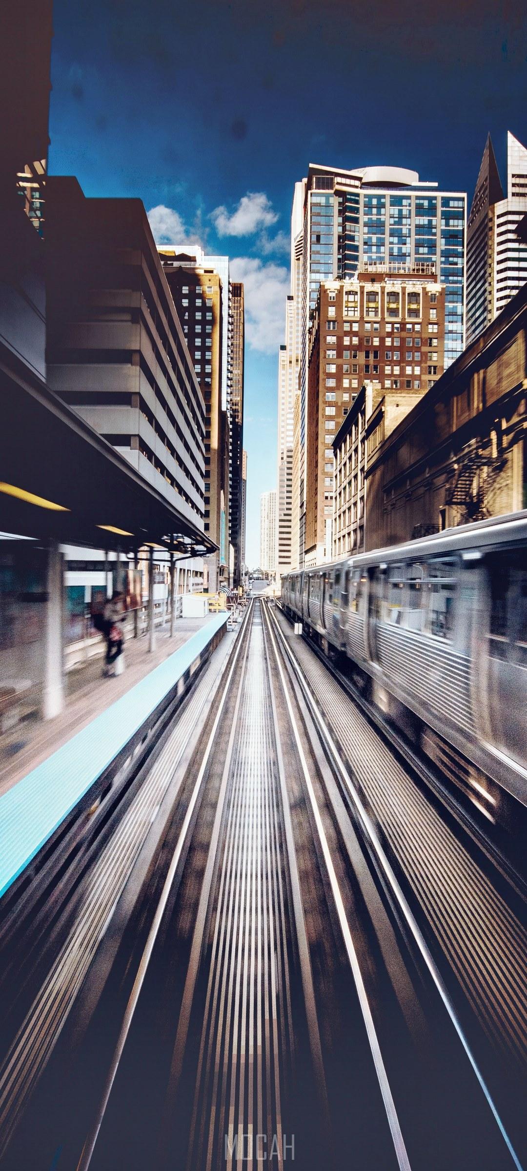 HD wallpaper, A Blurred Image Showing Trains Moving On An Outdoor Railway In Chicago, Samsung Galaxy A71 5G Wallpaper Hd, Train Station Action In Chicago, 1080X2400