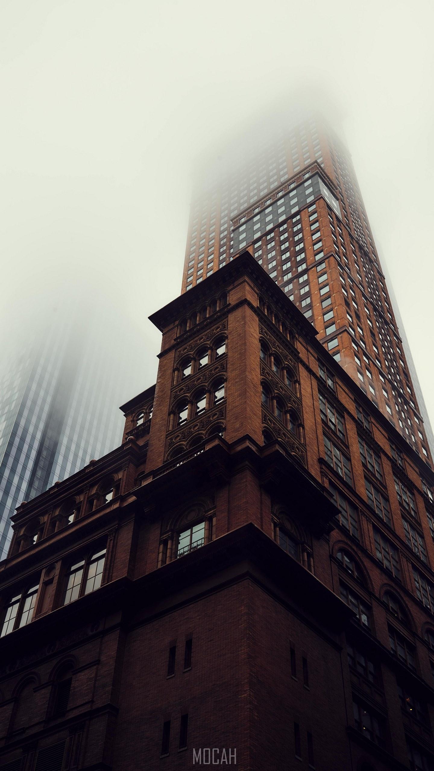 HD wallpaper, A Ground View Of A Dark Brick Skyscraper Disappearing Into Fog In New York City, 1440X2560, Lg G4 Wallpaper Hd Free Download, Giant In The Mist