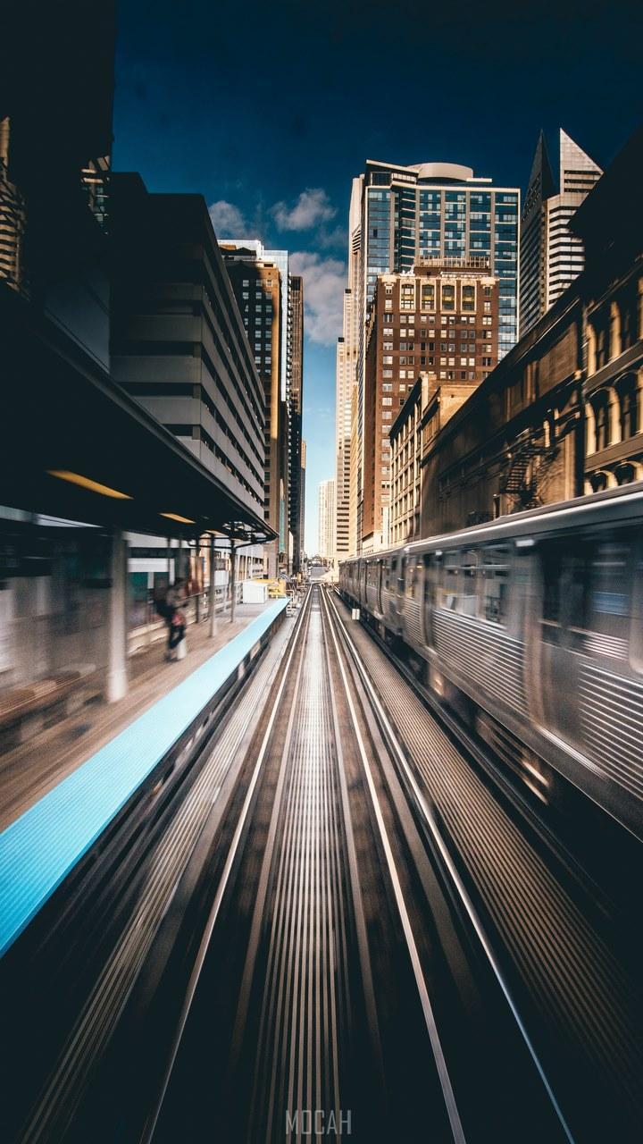 HD wallpaper, Train Station Action In Chicago, 720X1280, A Blurred Image Showing Trains Moving On An Outdoor Railway In Chicago, Sony Xperia R1 Plus Wallpaper Hd