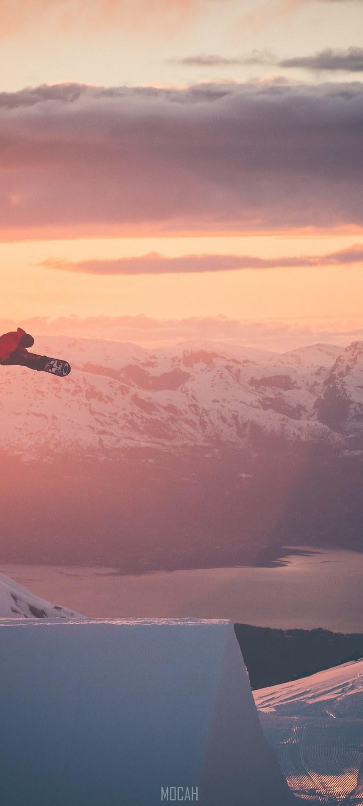 HD wallpaper, Samsung Galaxy A21 Wallpaper Full Hd, 720X1600, Snowboarder In Flight, A Snowboarder Is Airborne Surrounded By Golden Skies And Snowy Mountains