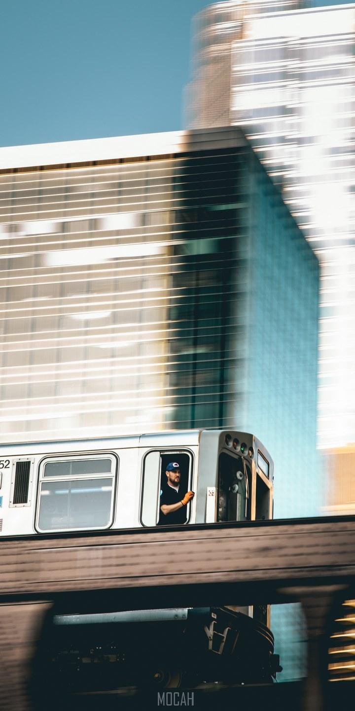 HD wallpaper, A Man Looking Out Of A Moving Urban Trail In Chicago, 720X1440, Man In A Moving Urban Train, Asus Zenfone Lite L1 Za551Kl Wallpaper Hd Free Download