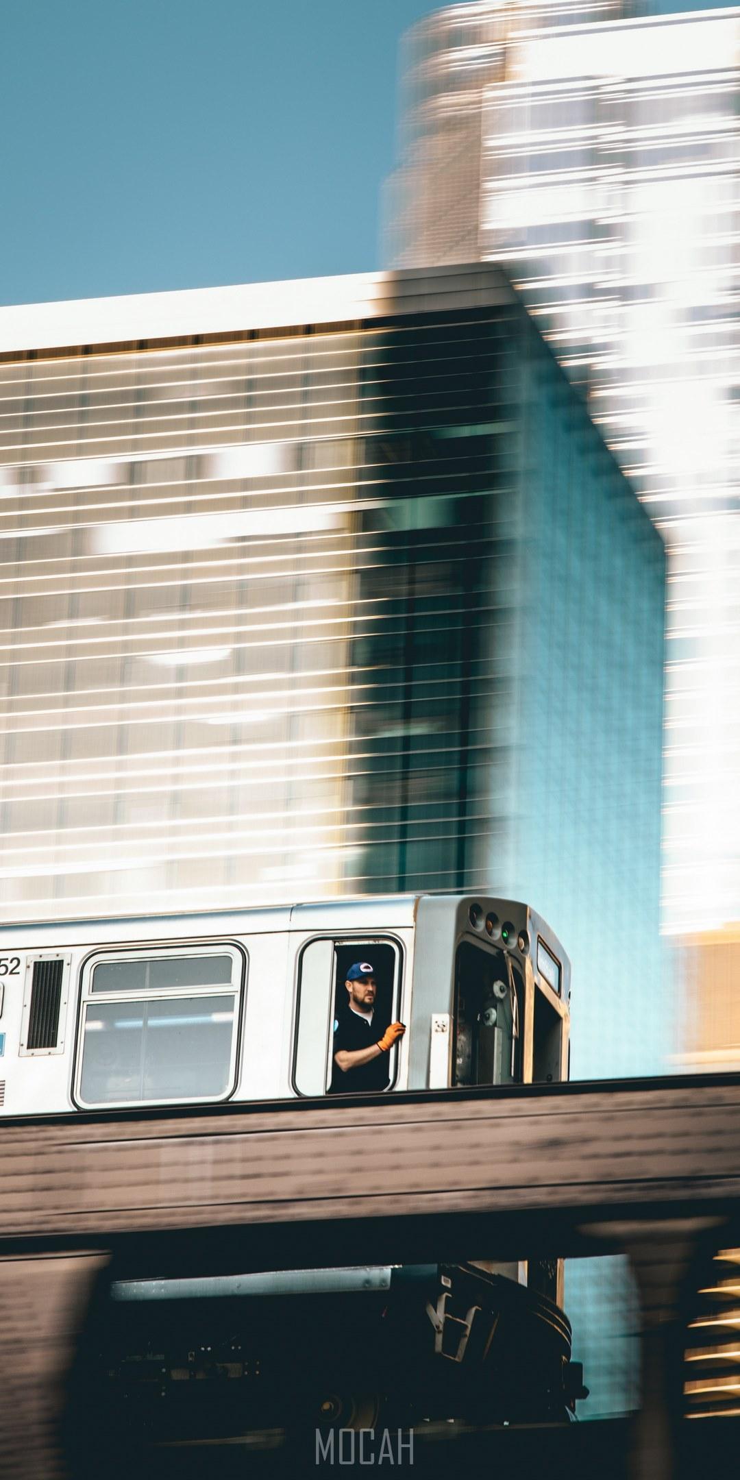 HD wallpaper, A Man Looking Out Of A Moving Urban Trail In Chicago, 1080X2160, Man In A Moving Urban Train, Lg Q Stylo 4 Screensaver