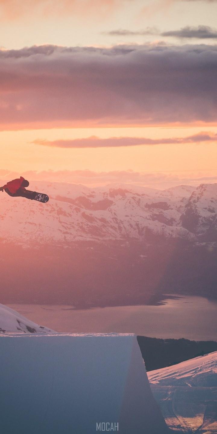 HD wallpaper, 720X1440, Snowboarder In Flight, Motorola Moto E5 Plus Wallpaper 1080P, A Snowboarder Is Airborne Surrounded By Golden Skies And Snowy Mountains