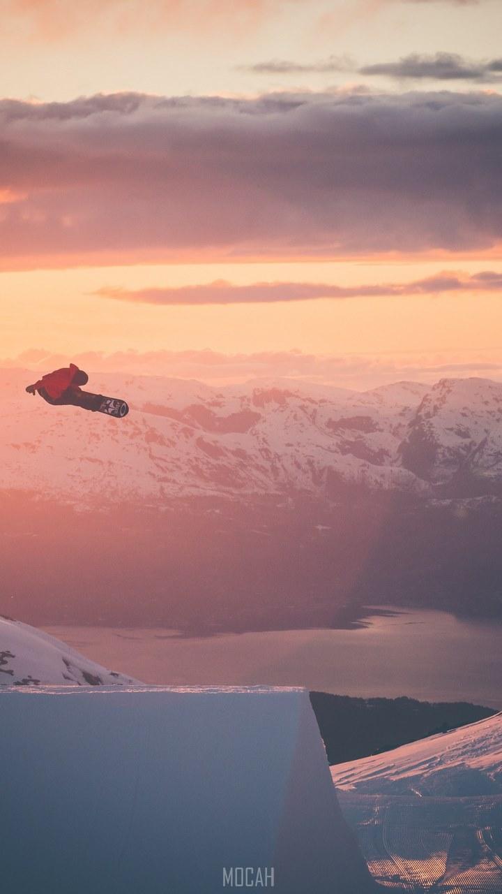 HD wallpaper, A Snowboarder Is Airborne Surrounded By Golden Skies And Snowy Mountains, Snowboarder In Flight, Xiaomi Redmi 2 Wallpaper Free Download, 720X1280